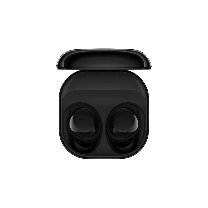 White wireless Bluetooth earbuds in an open charging case